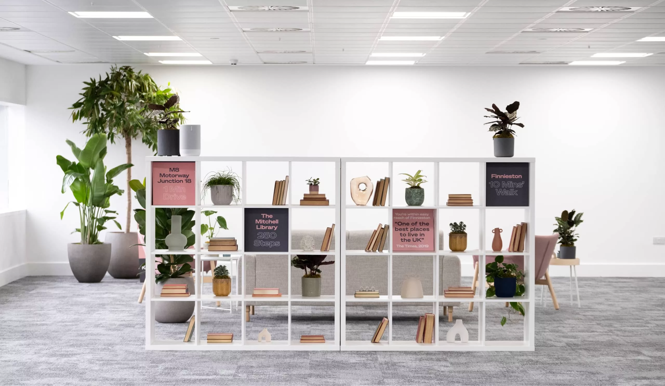 300 Bath Street interior shelving with branding.